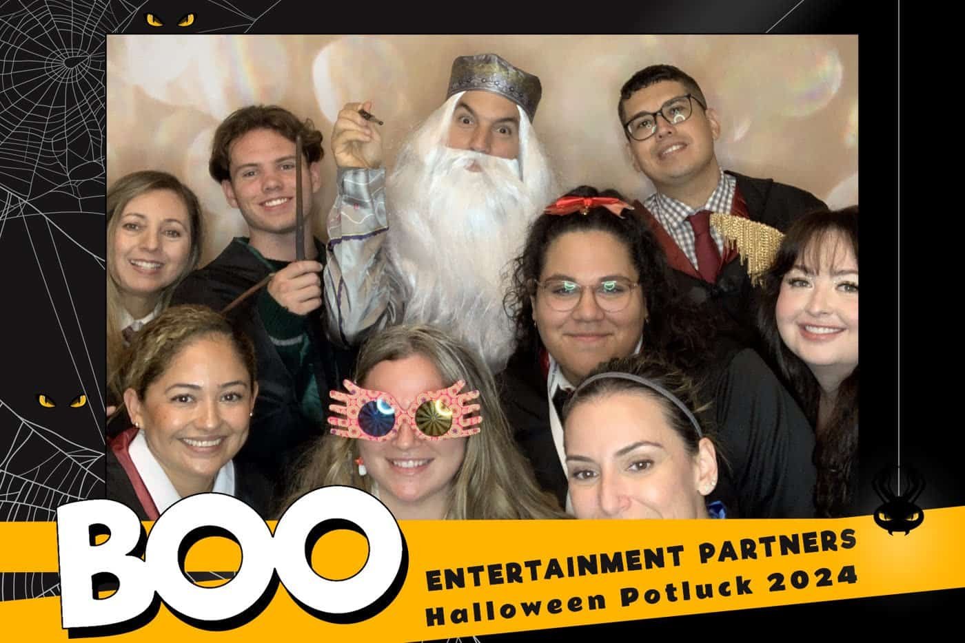 Office team in Halloween costumes on a custom-branded photo booth print for a company potluck