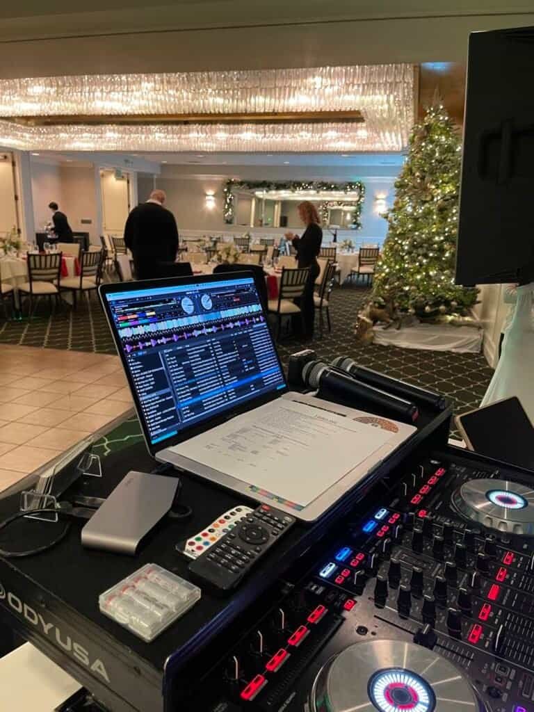 DJ controller and mic set up at a corporate holiday party